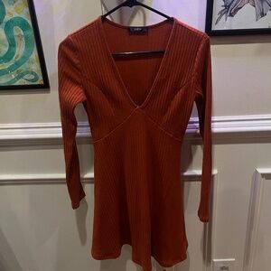 Long sleeved orange cotton dress